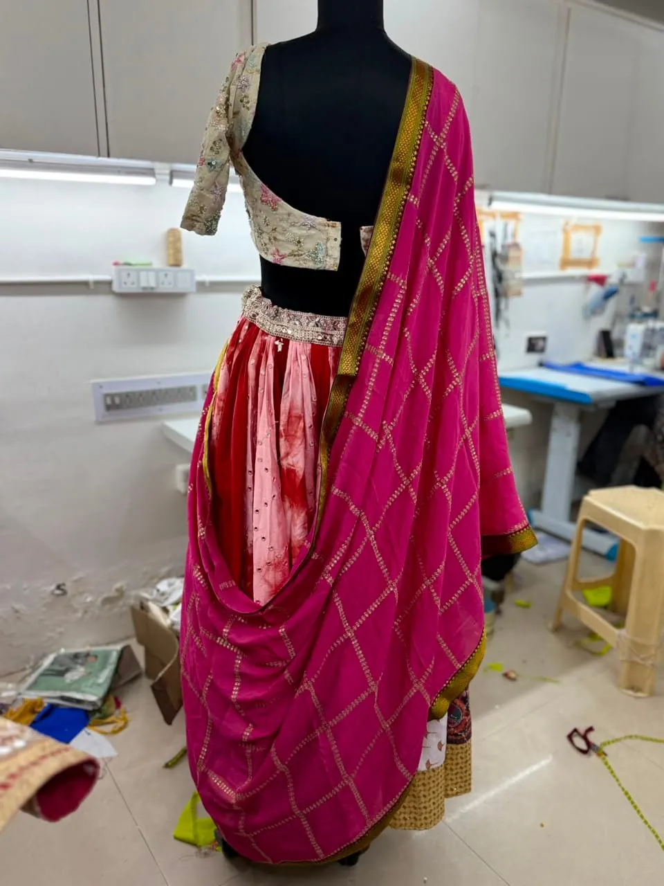 Before, back view: garment on a mannequin